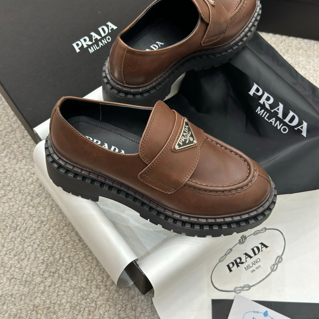 PRADA 25S LOAFER 50MM IN DARK BROWN CALFSKIN LOGO
