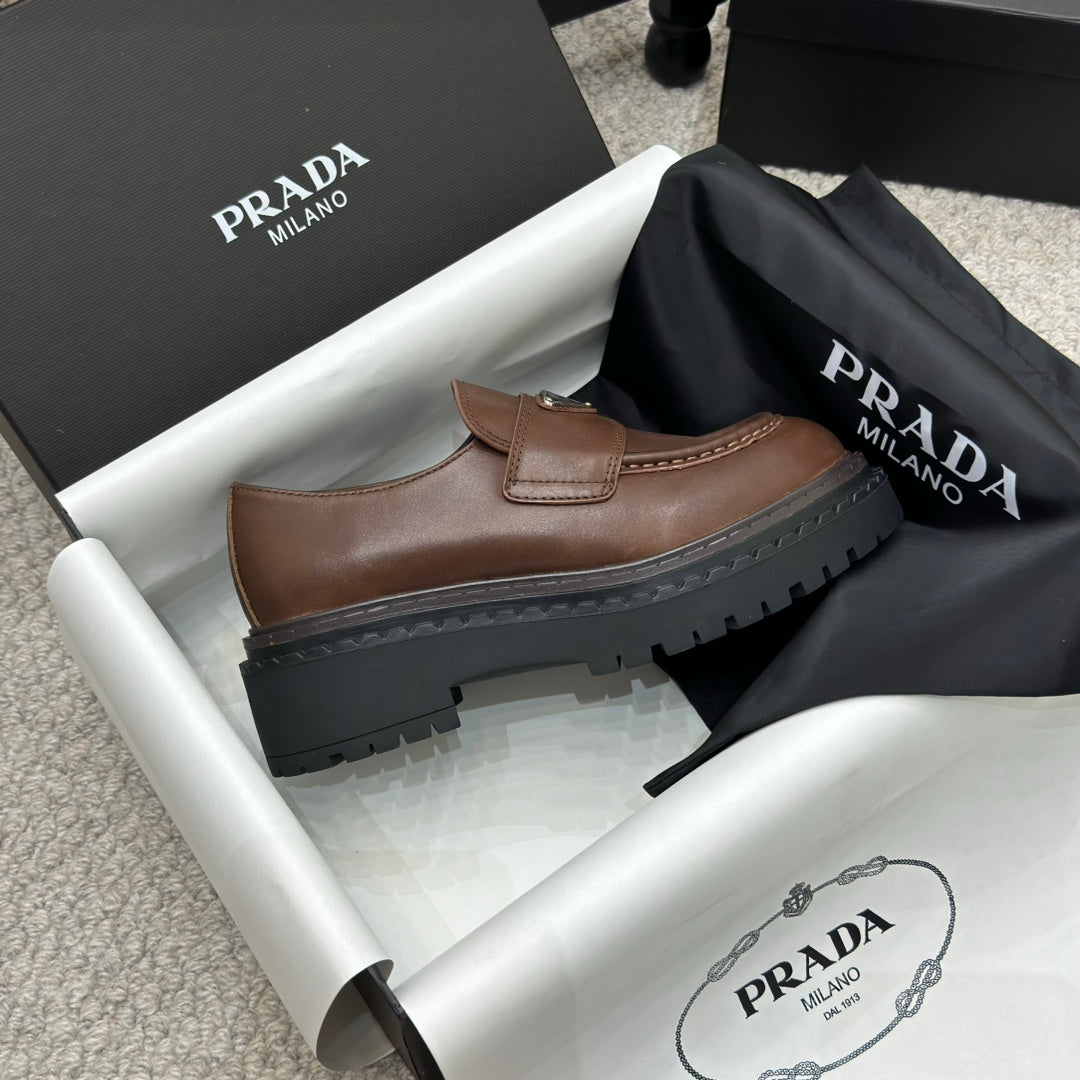 PRADA 25S LOAFER 50MM IN DARK BROWN CALFSKIN LOGO