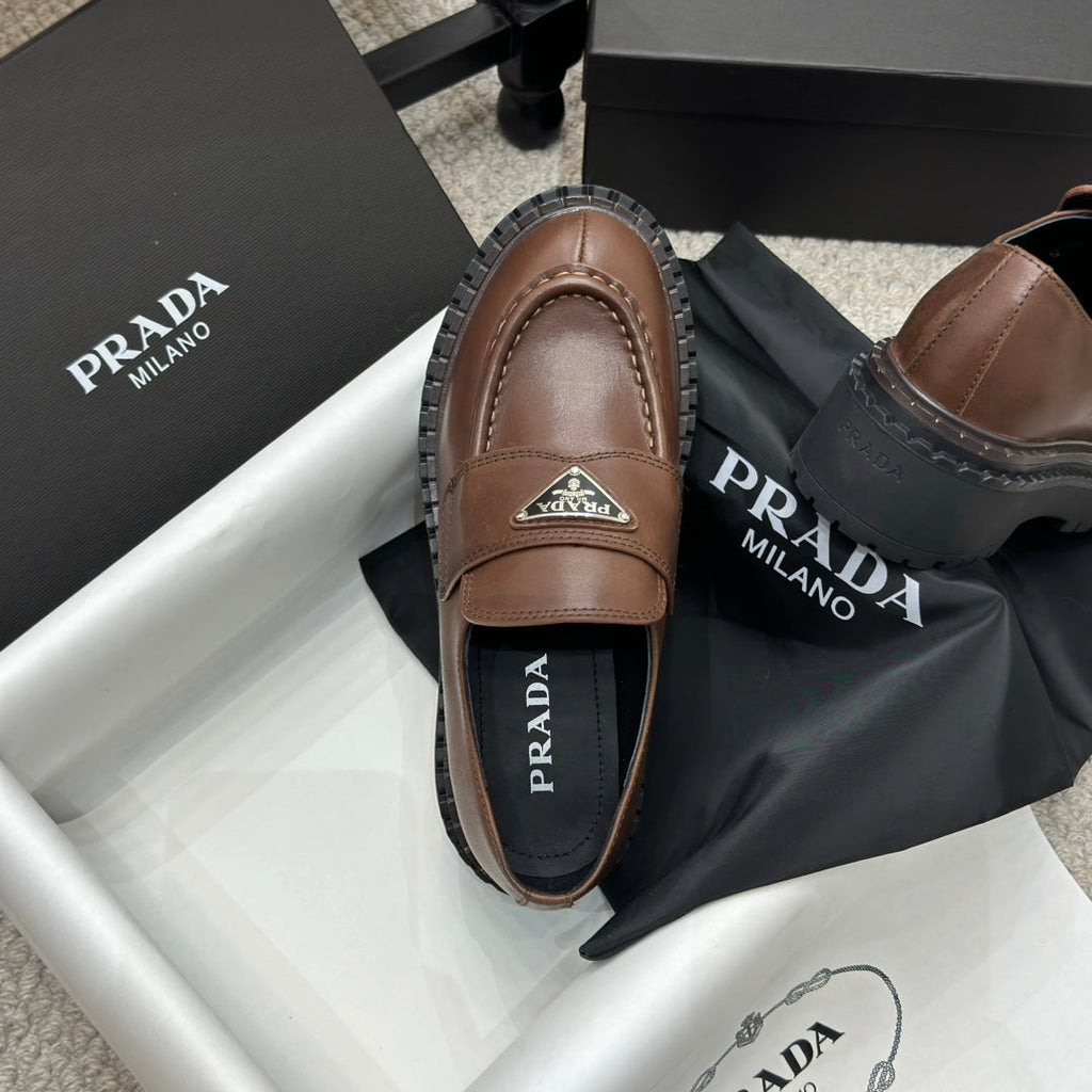 PRADA 25S LOAFER 50MM IN DARK BROWN CALFSKIN LOGO
