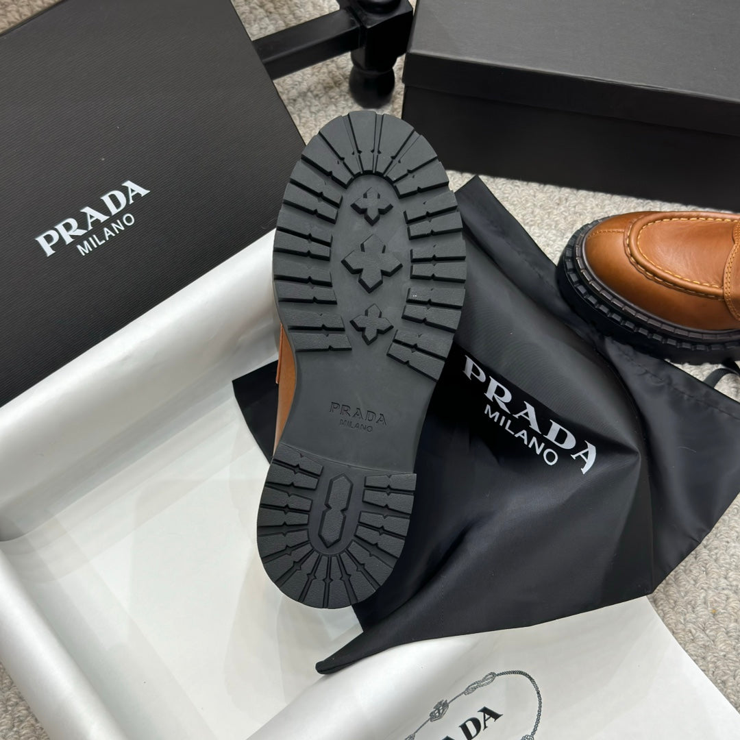 PRADA 25S LOAFER 50MM IN BURNT ORANGE CALFSKIN LOGO