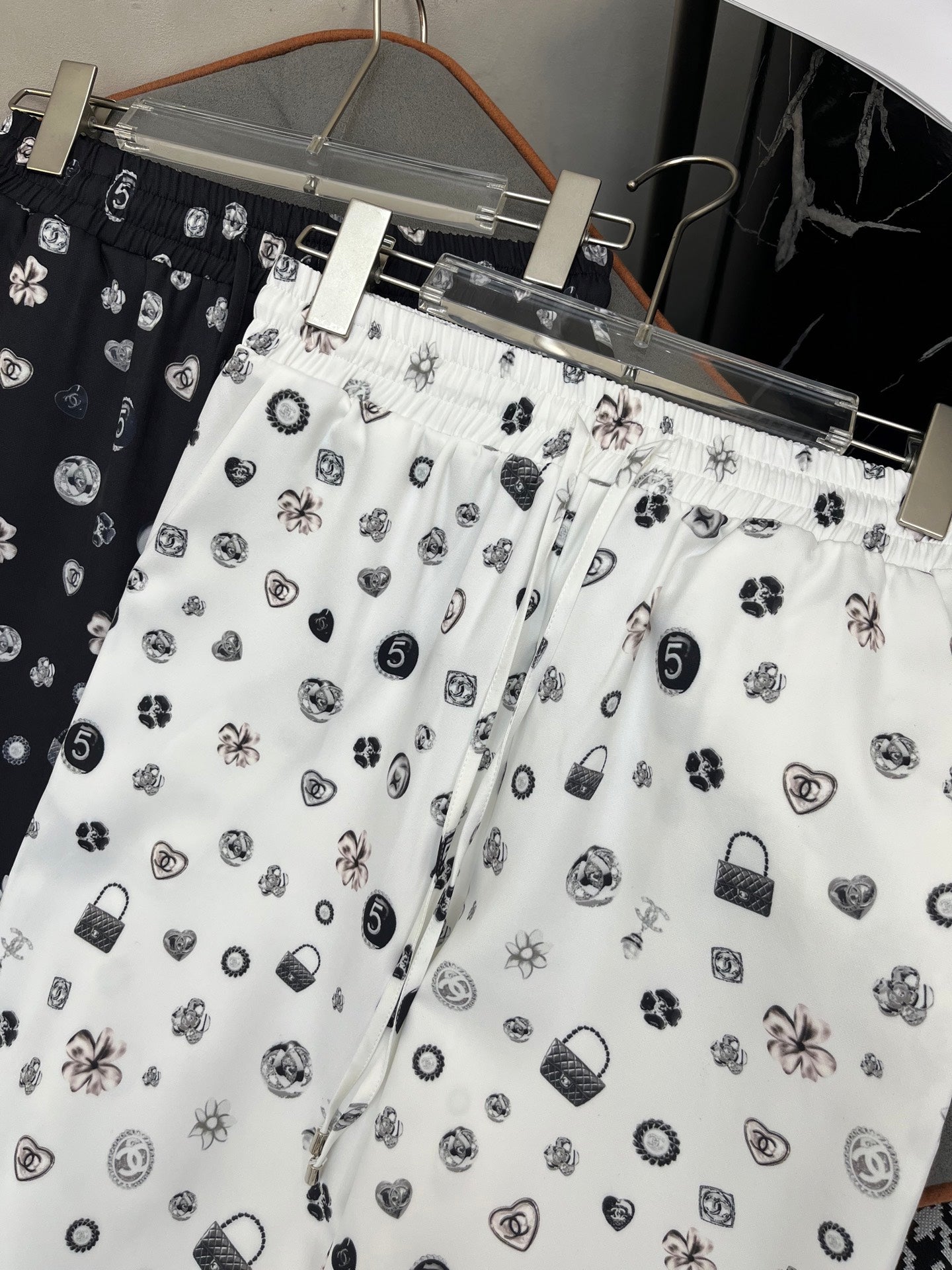 ALL-OVER LOGO PRINTED PANTS WITH STRETCH WAIST