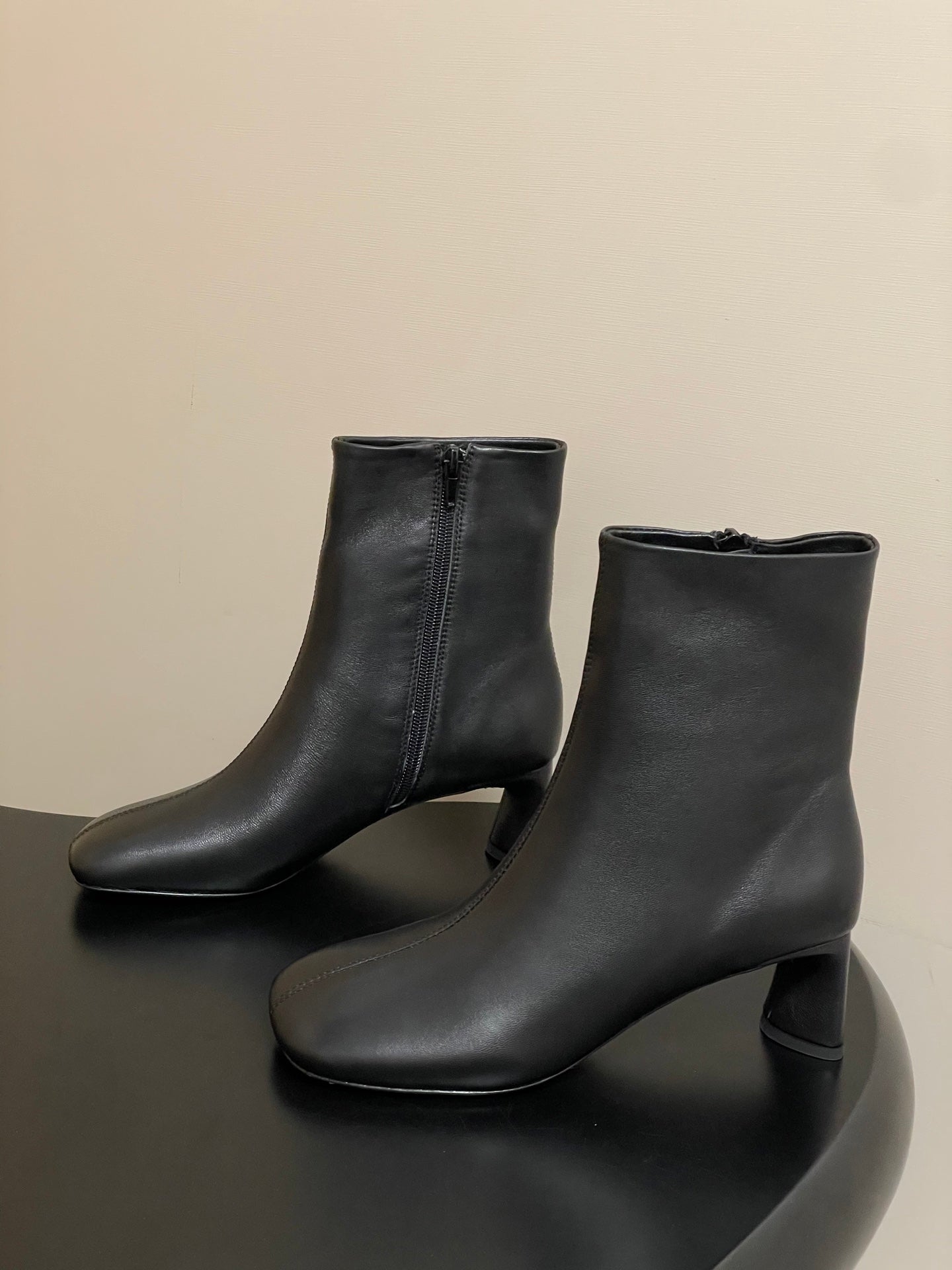 BALENCIAGA 25S ANKLE BOOTS 65 MM IN BLACK COW LEATHER