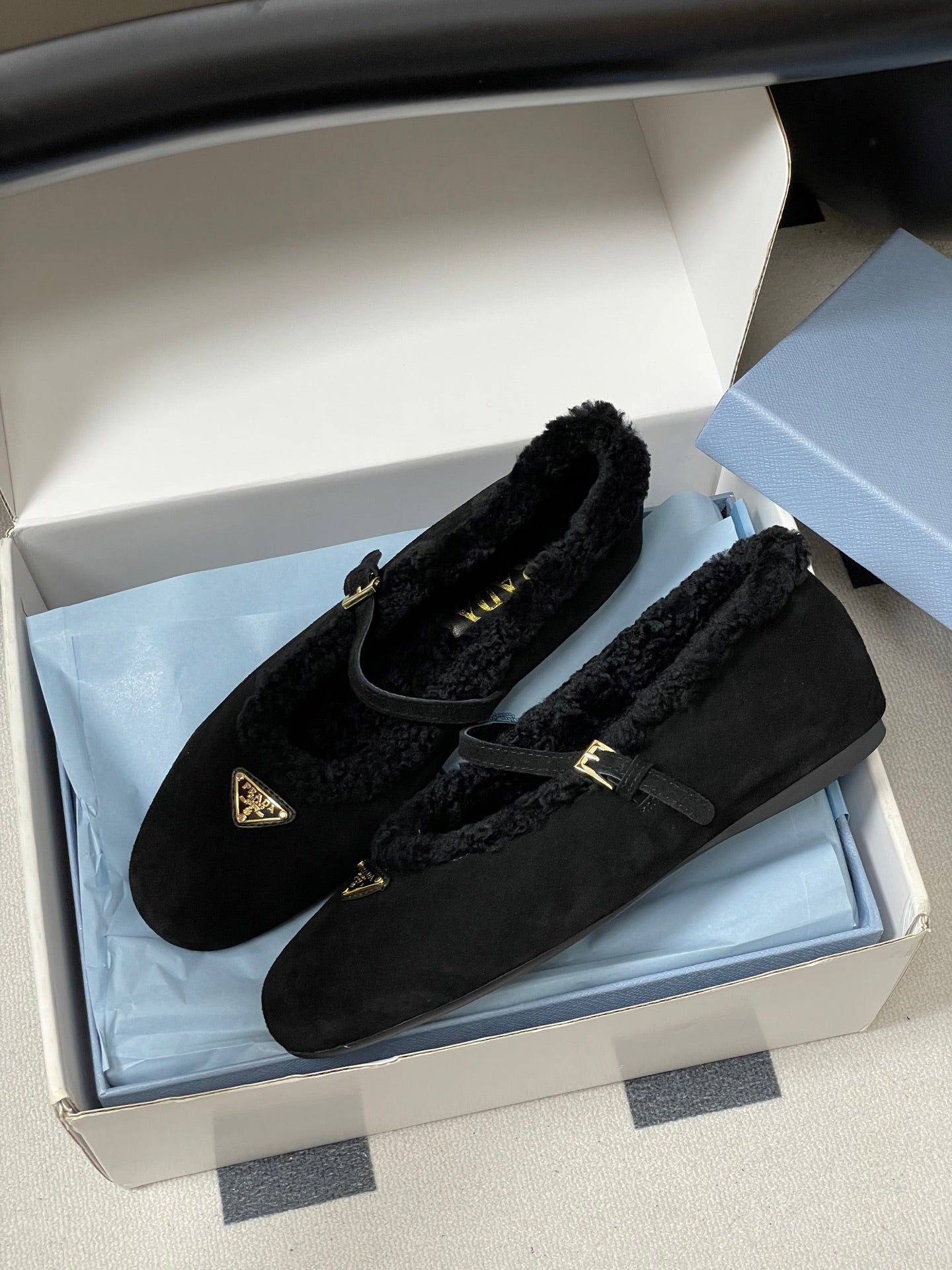 PRADA 25S MARY JANE FLATS IN BLACK SUEDE WITH GOLD HARDWARE