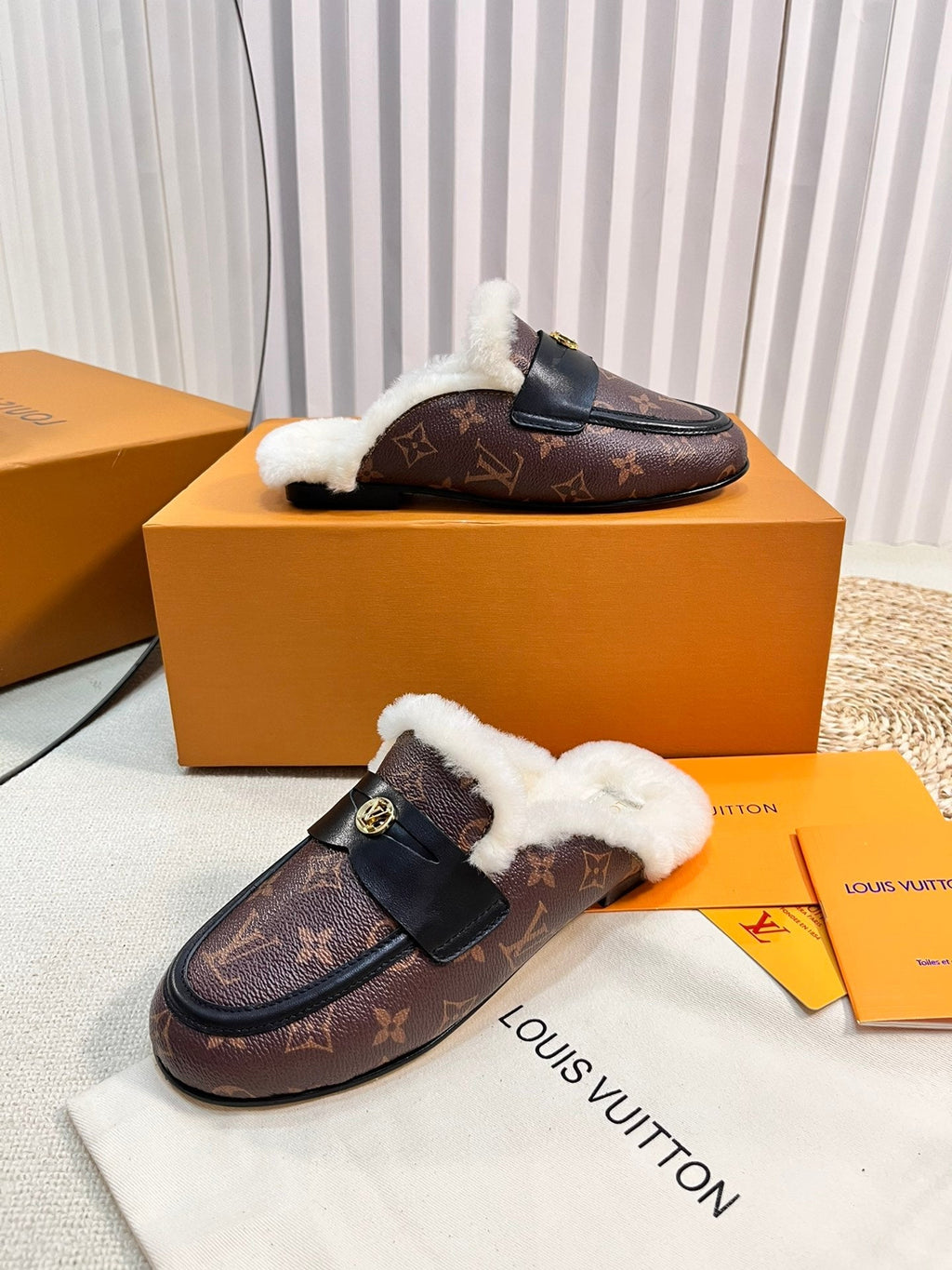 FLAT MULE IN CHESTNUT BROWN MONOGRAM CALFSKIN AND SHEARLING LINING