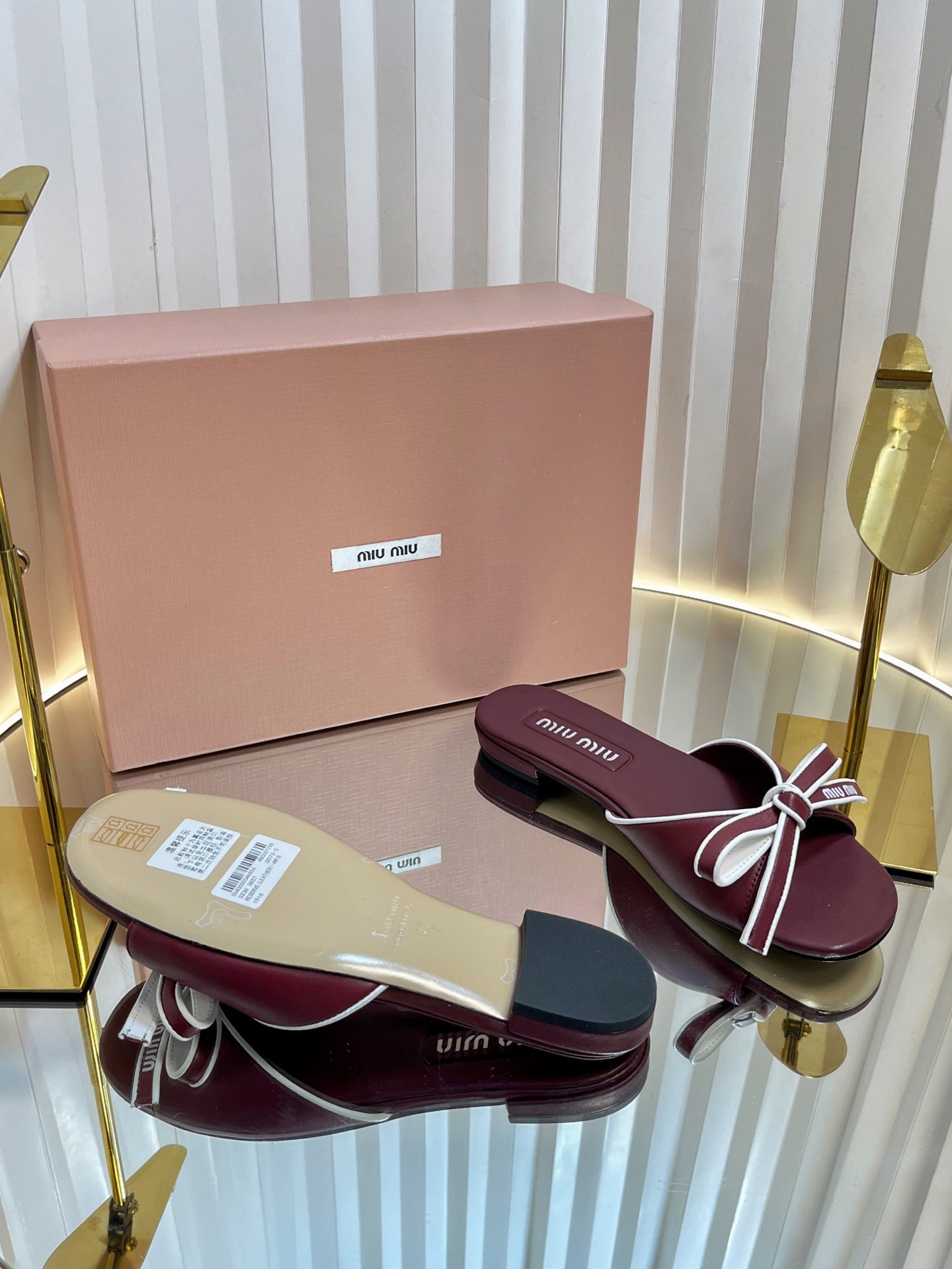 SLIDES SANDALS IN BURGUNDY RED CALFSKIN BOW IN TRAP