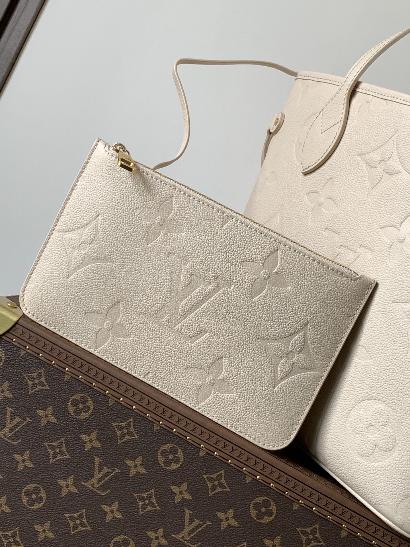 NEVERFULL 32 LIGHT BEIGE MONOGRAM EMPREINTE LEATHER