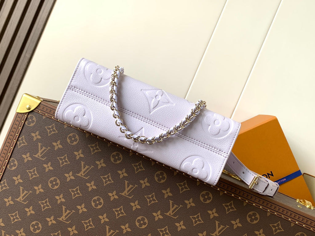 LV 25S ONTHEGO EAST WEST BAG 25 IN LIGHT LAVENDER CALFSKIN MONOGRAM EMPREINTE