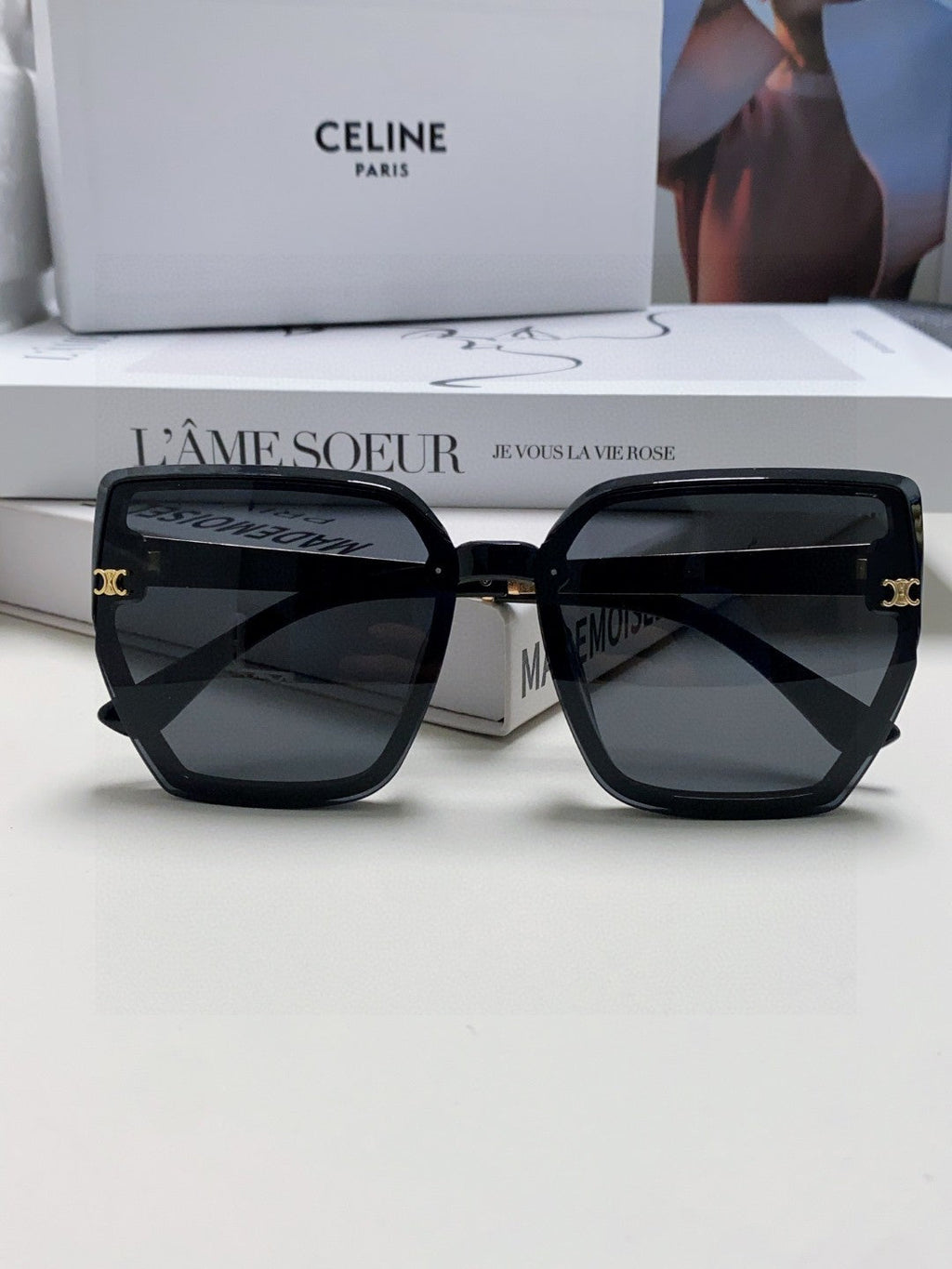 TRIOMPHE SUNGLASS 497831 IN BLACK ACETATE EMBOSSED LOGO