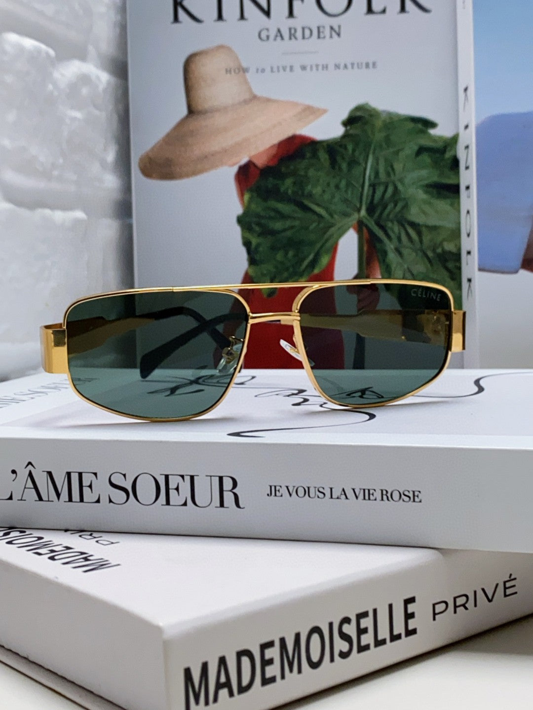 TRIOMPHE SUNGLASS 512997 IN GOLD METAL BLUE LENSES