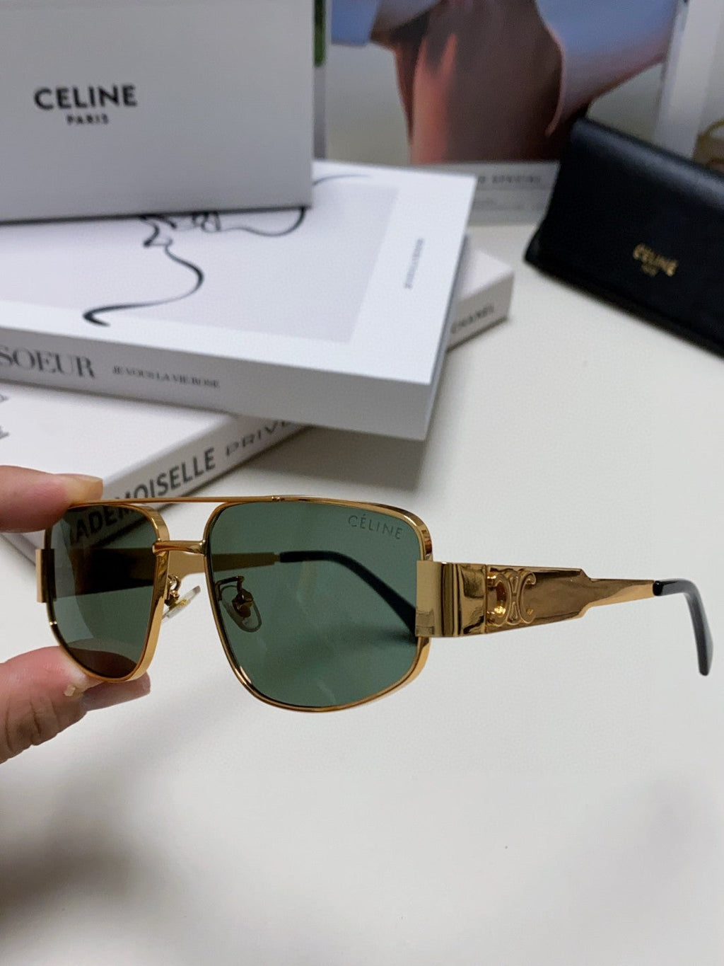 TRIOMPHE SUNGLASS 512997 IN GOLD METAL BLUE LENSES