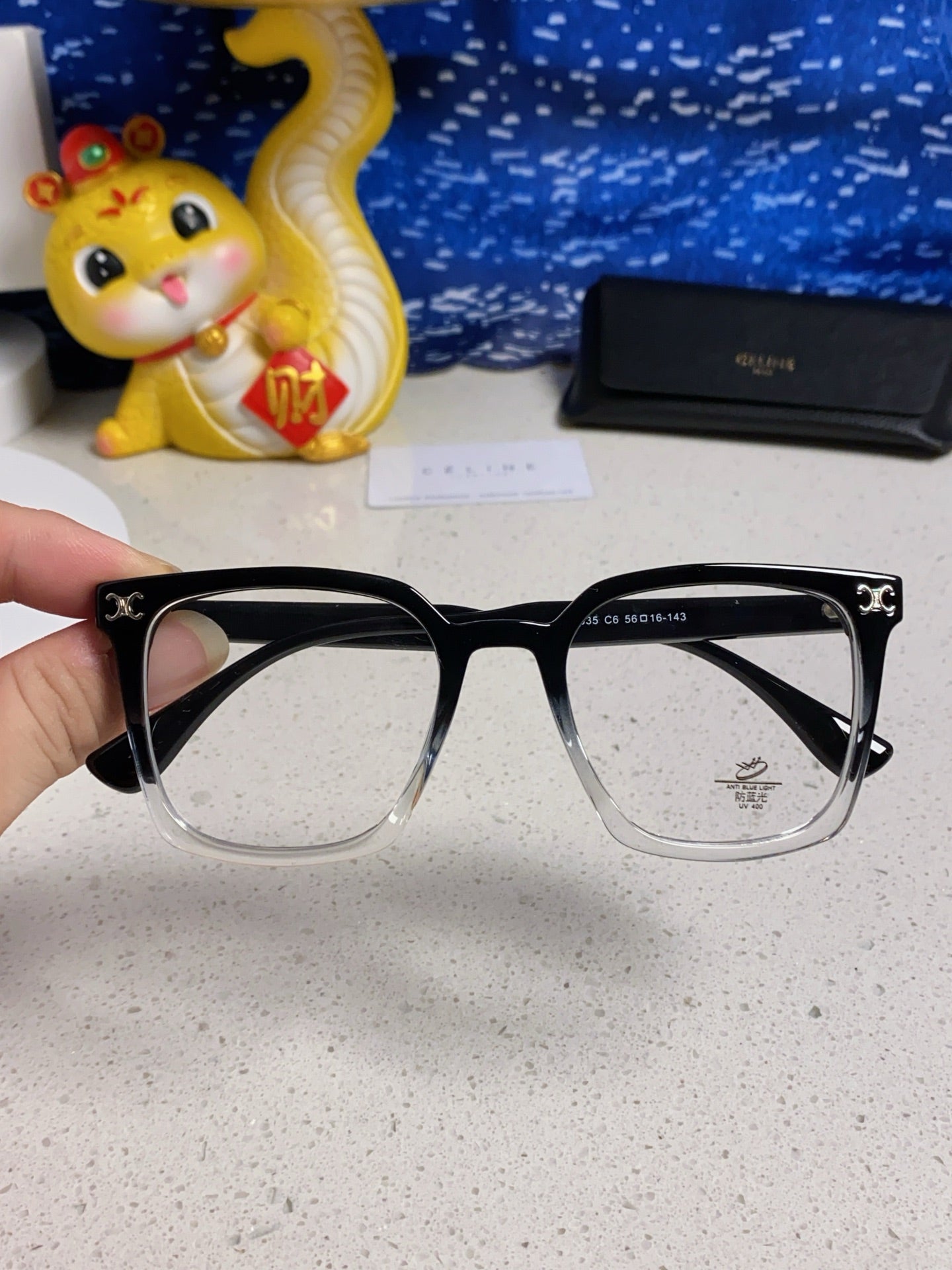 TRIOMPHE SUNGLASSES 563255 IN BLACK TO CLEAR ACETATE