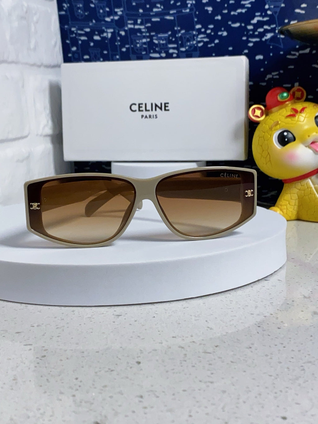 TRIOMPHE SUNGLASS 533218 IN IVORY ACETATE CAMEL LENSES