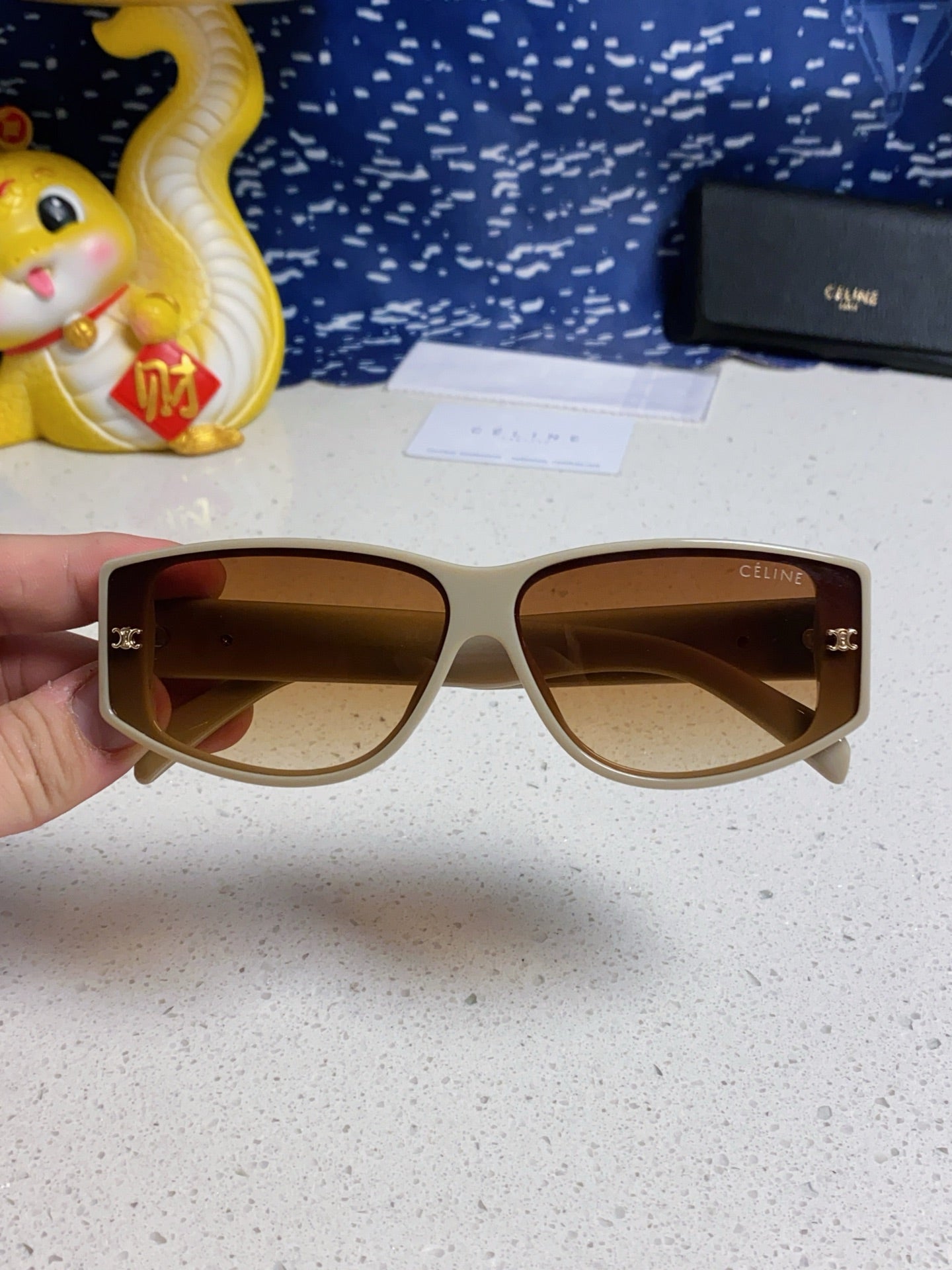 TRIOMPHE SUNGLASS 533218 IN IVORY ACETATE CAMEL LENSES