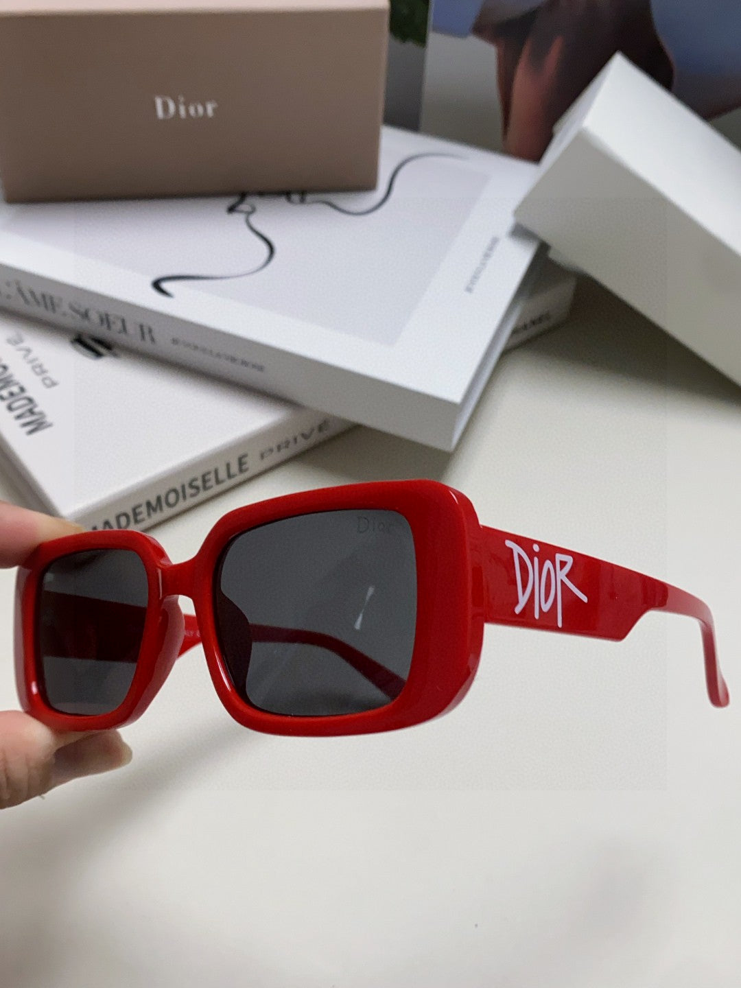 MONTAIGNE SUNGLASS 571592 IN RED ACETATE TEXT LOGO