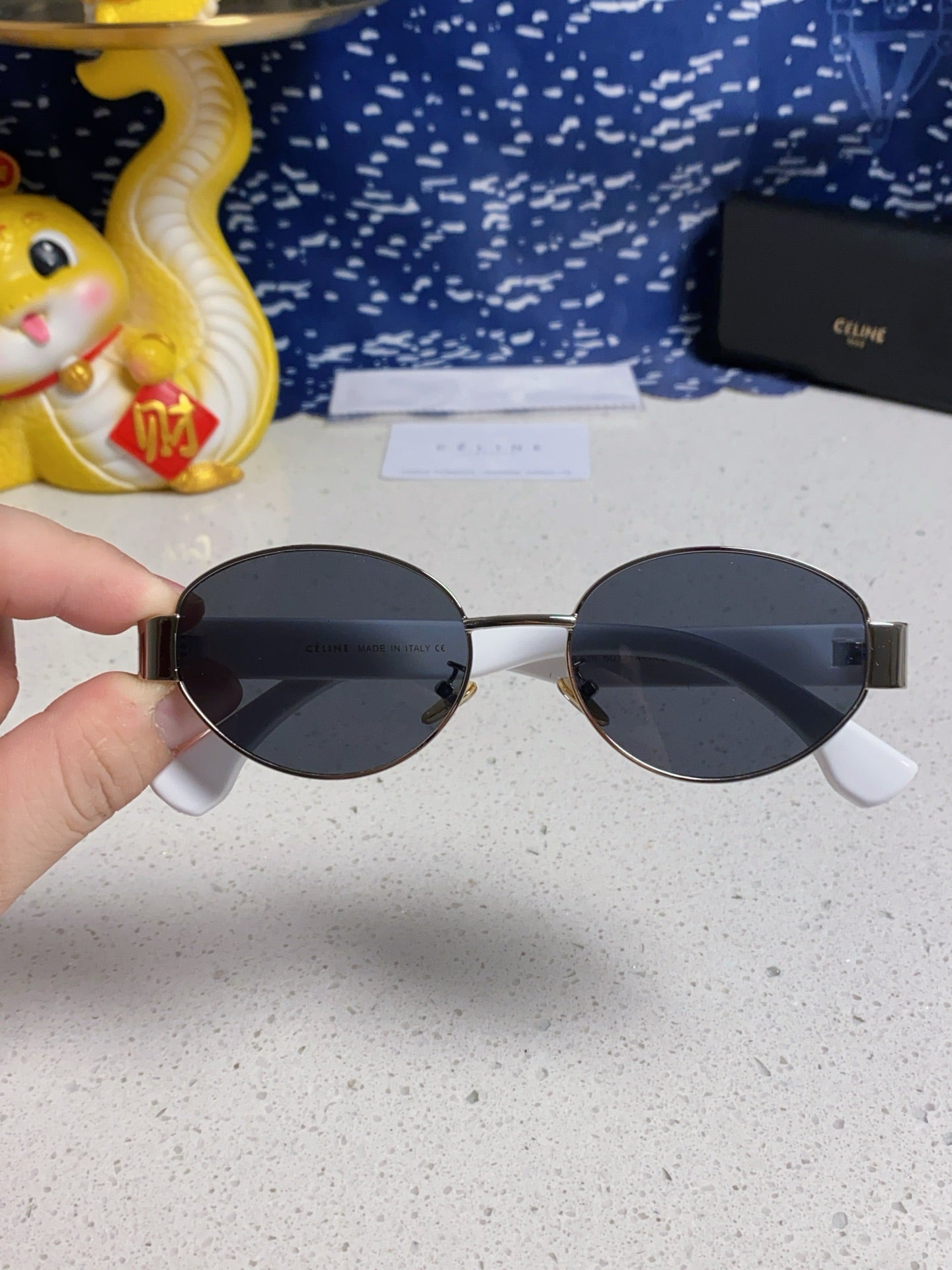 TRIOMPHE SUNGLASS 538530 IN WHITE ACETATE BLACK LENSES