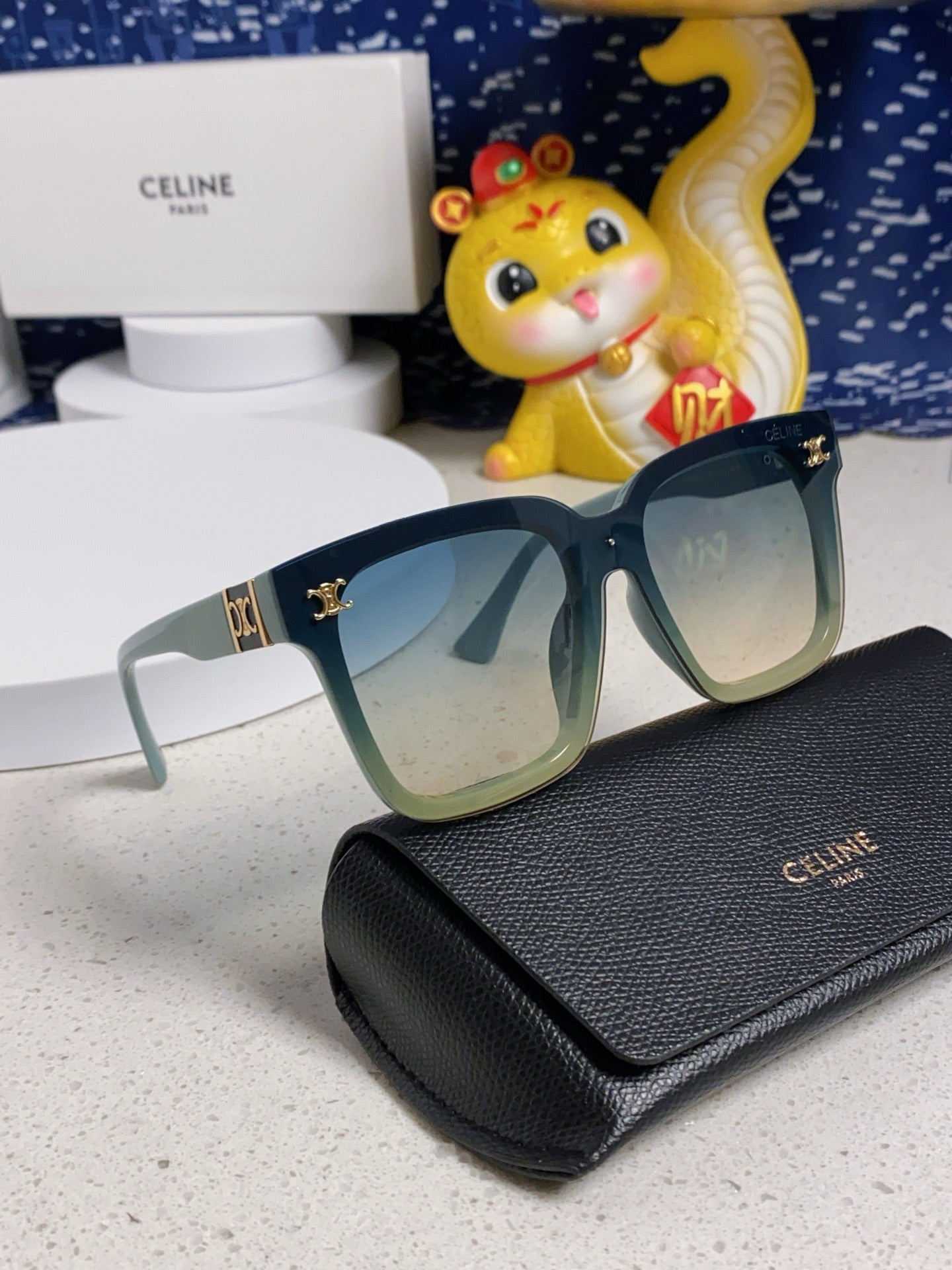 TRIOMPHE SUNGLASSES 548632 IN BABY BLUE ACETATE