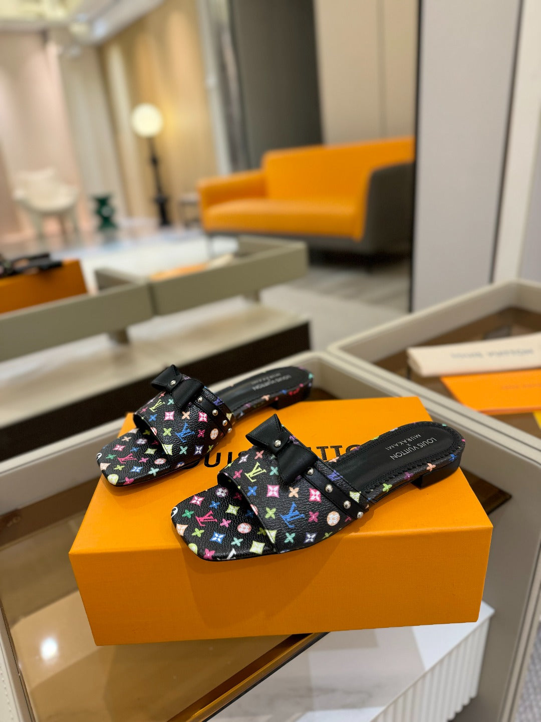 LV X TM 6AM FLAT MULE IN BLACK MONOGRAM CALFSKIN