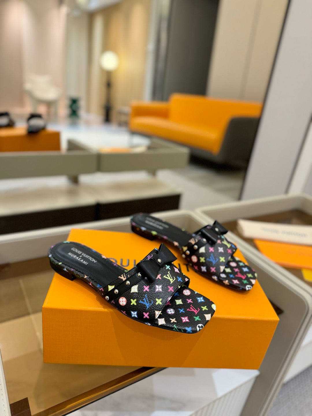 LV X TM 6AM FLAT MULE IN BLACK MONOGRAM CALFSKIN