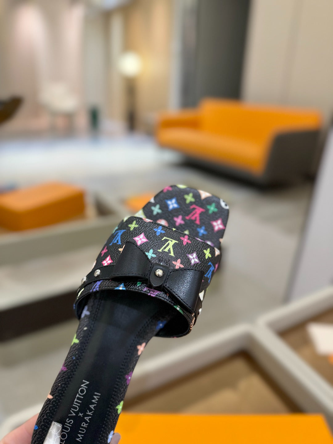 LV X TM 6AM FLAT MULE IN BLACK MONOGRAM CALFSKIN