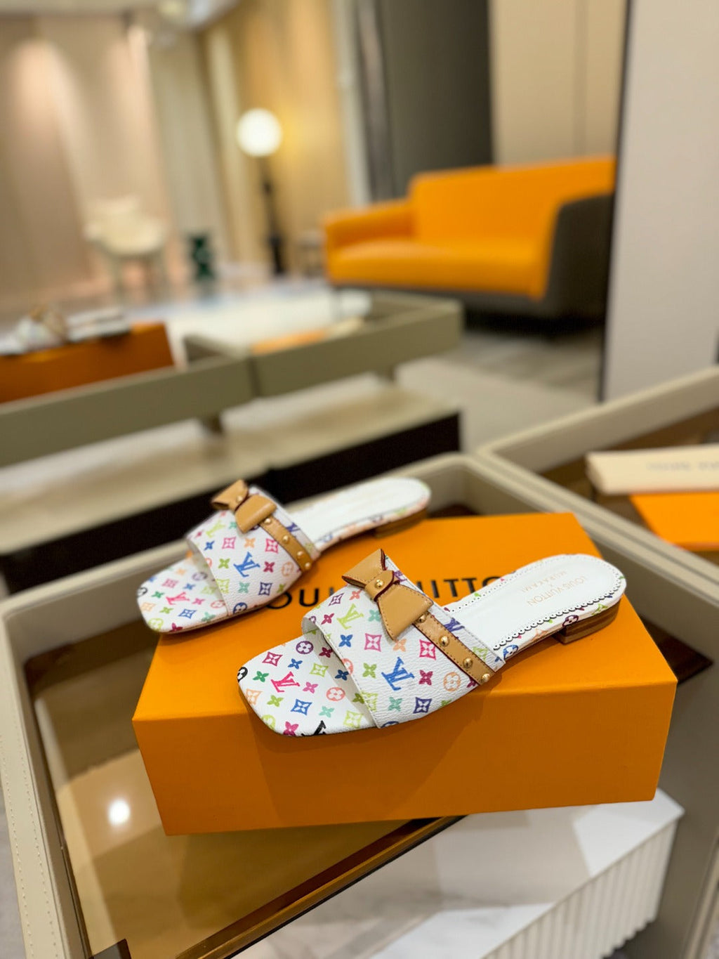 LV X TM 6AM FLAT MULE IN WHITE MONOGRAM CALFSKIN