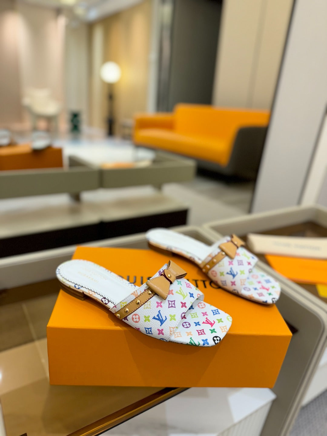 LV X TM 6AM FLAT MULE IN WHITE MONOGRAM CALFSKIN