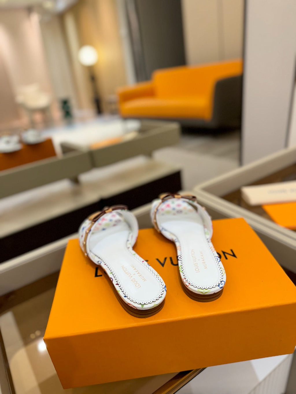 LV X TM 6AM FLAT MULE IN WHITE MONOGRAM CALFSKIN