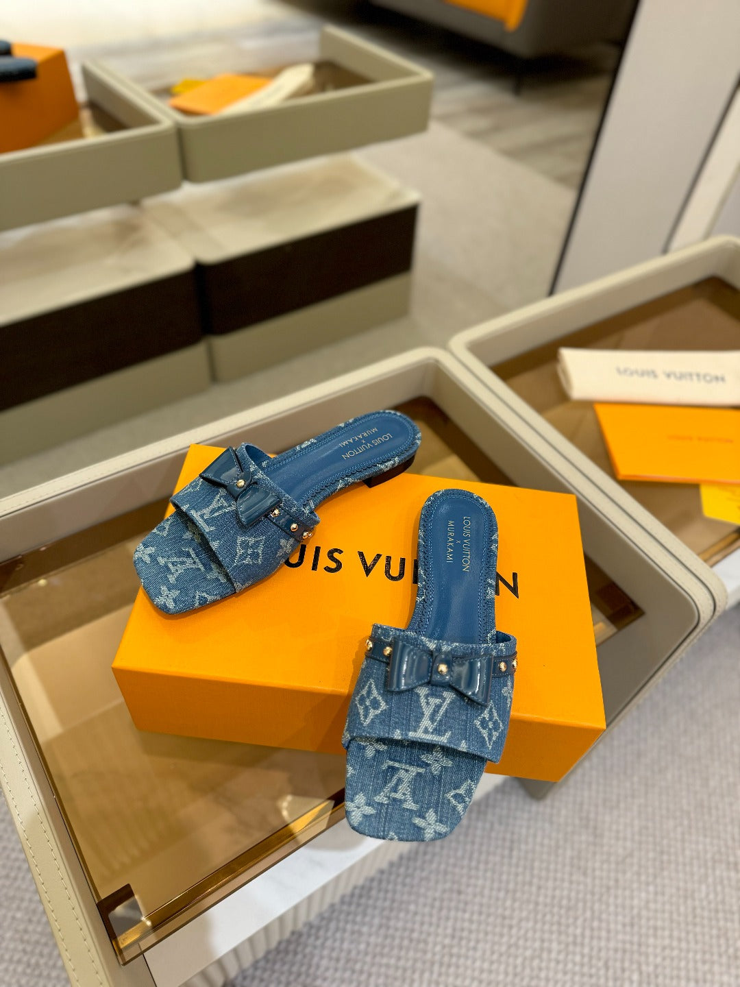 LV X TM 6AM FLAT MULE IN NAVY BLUE MONOGRAM DENIM