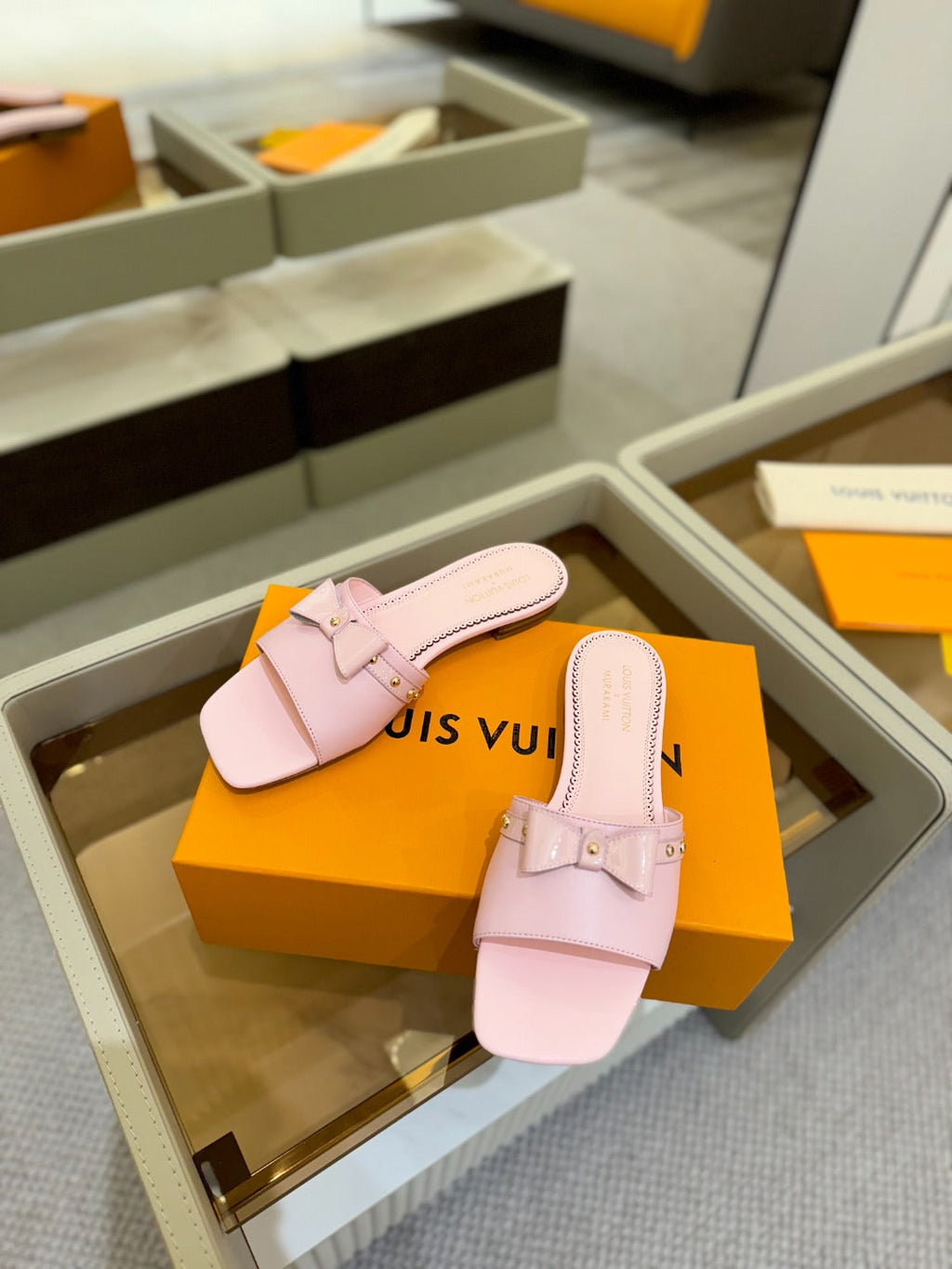 LV X TM 6AM FLAT MULE IN BABY PINK CALFSKIN