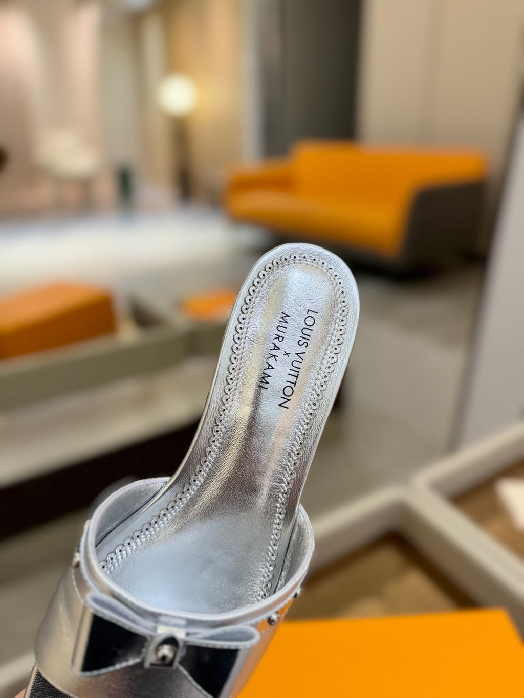 LV X TM 6AM FLAT MULE IN SILVER CALFSKIN