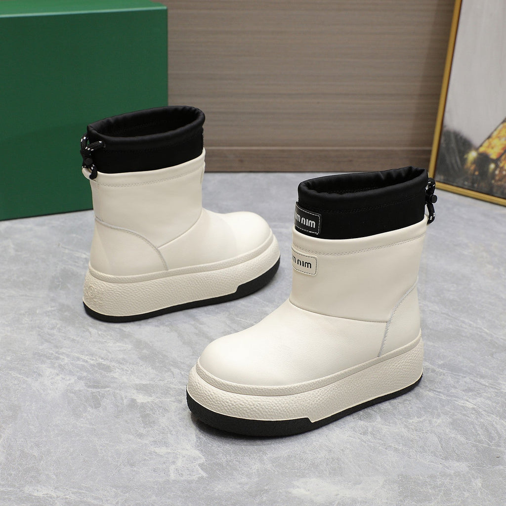 THICK-SOLED SNOW BOOTS IN WHITE CALFSKIN MIX BLACK NYLON