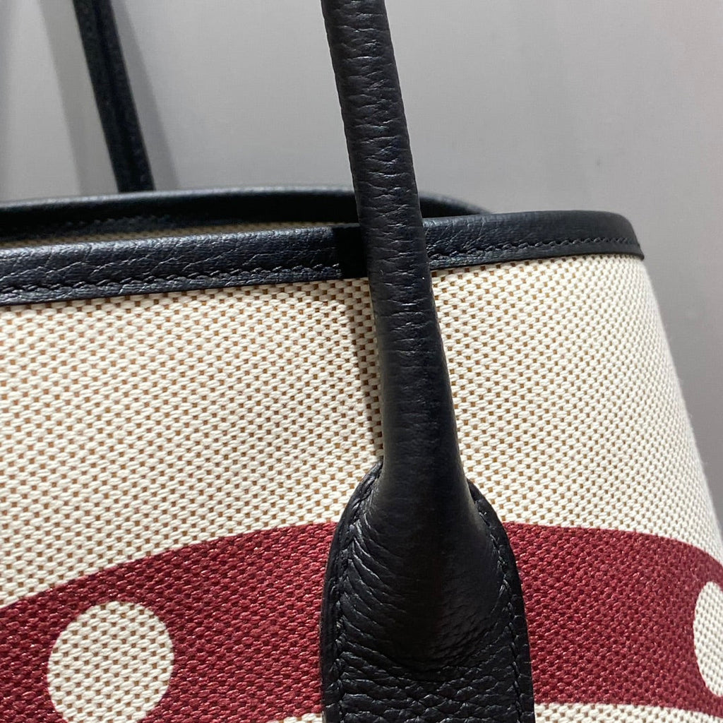 GARDEN PARTY 36 IN MULTICOLOR TOILE H CANVAS BLACK CALFSKIN OVERLAPPING POLKA RINGS PRINT