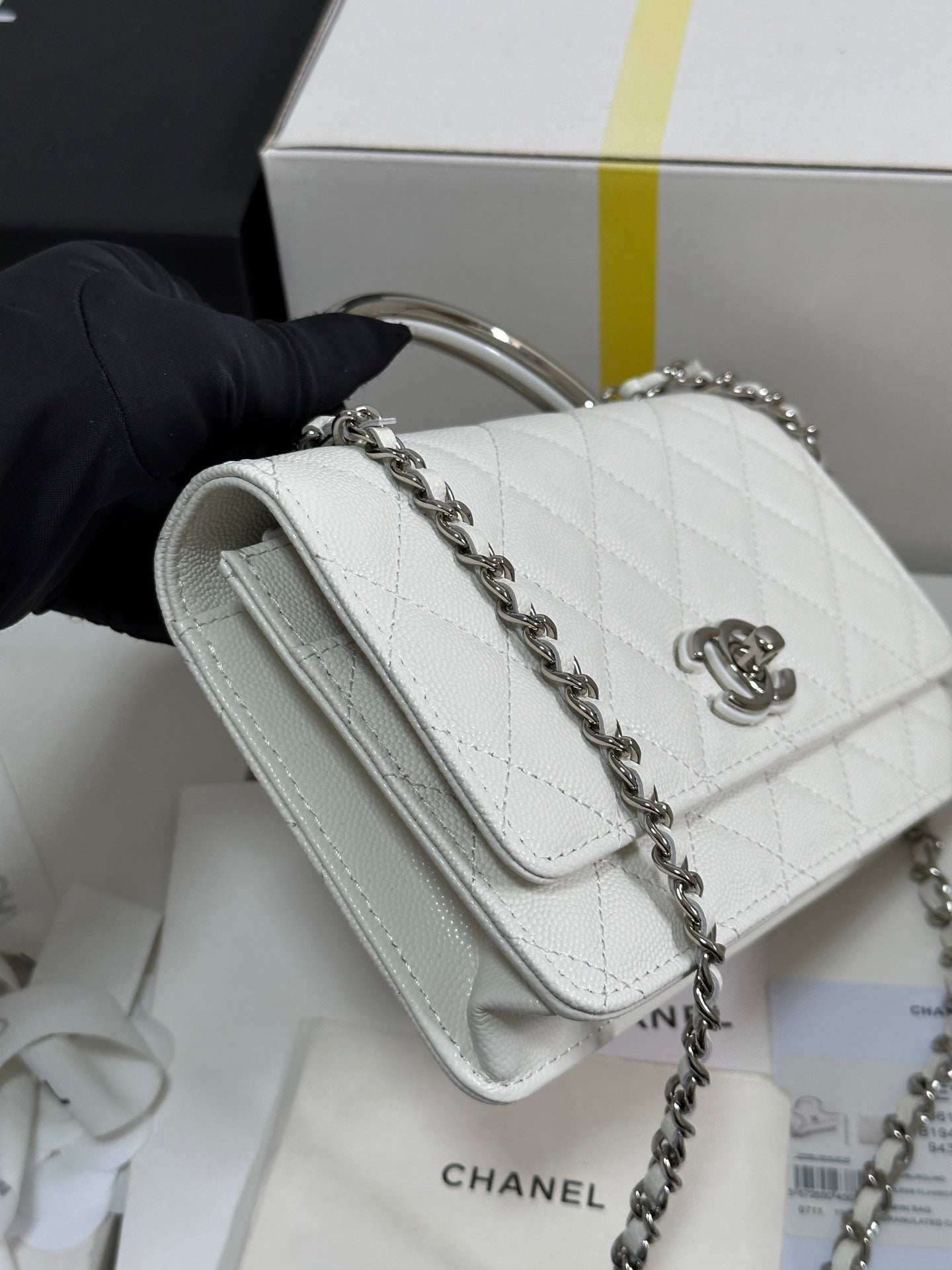 FLAP BAG WITH SILVER-TONE HANDLE 19 IN WHITE CAVIAR SKIN