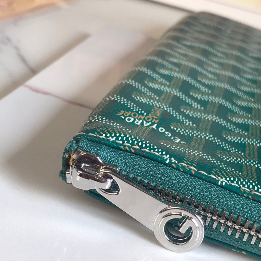 SÉNAT MGM POUCH 40 IN GREEN GOYARDINE CANVAS