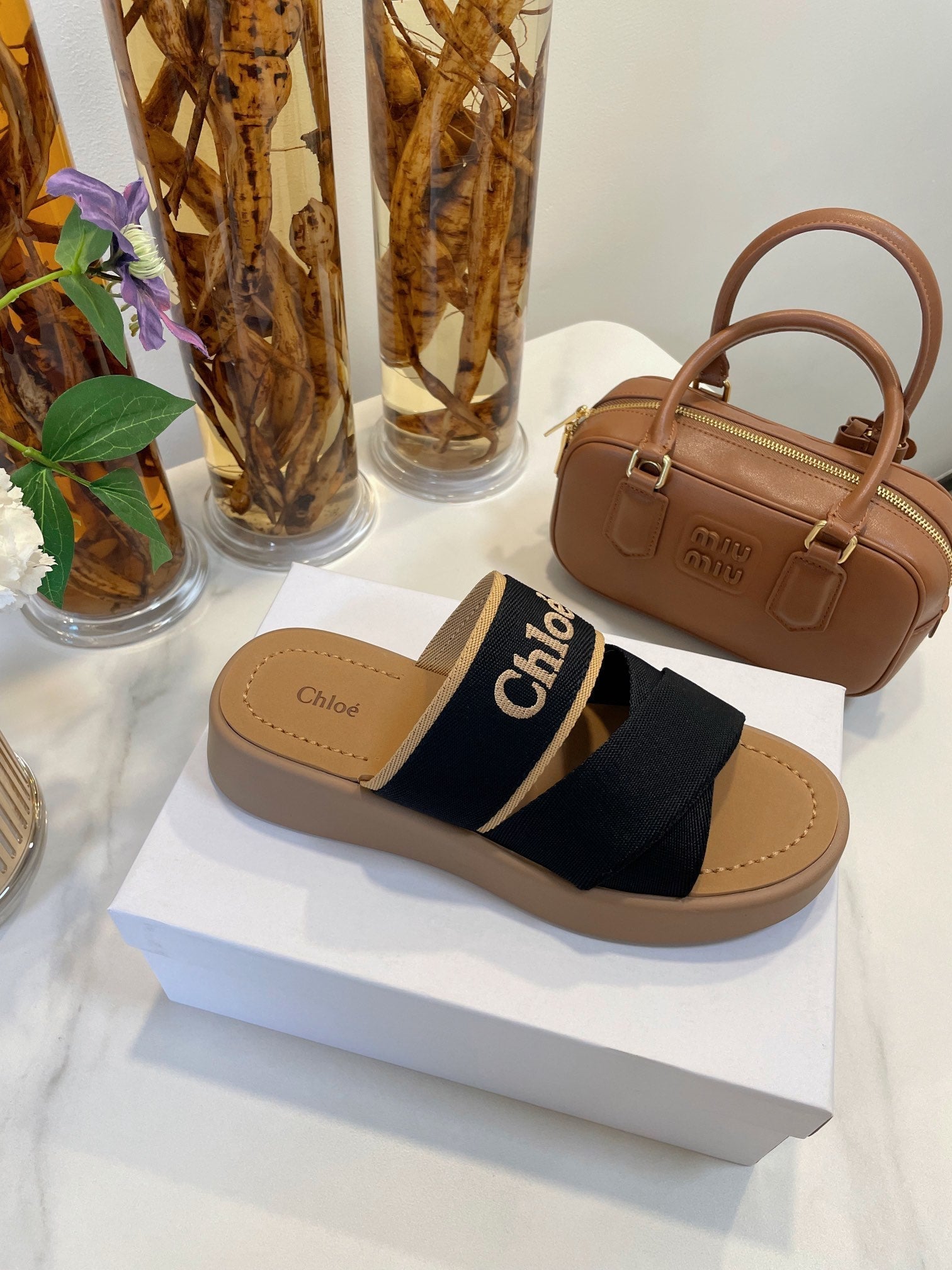 CHLOÉ WOODY WEDGE SANDALS IN BLACK CANVAS WITH CIDER BROWN RUBBER SOLE