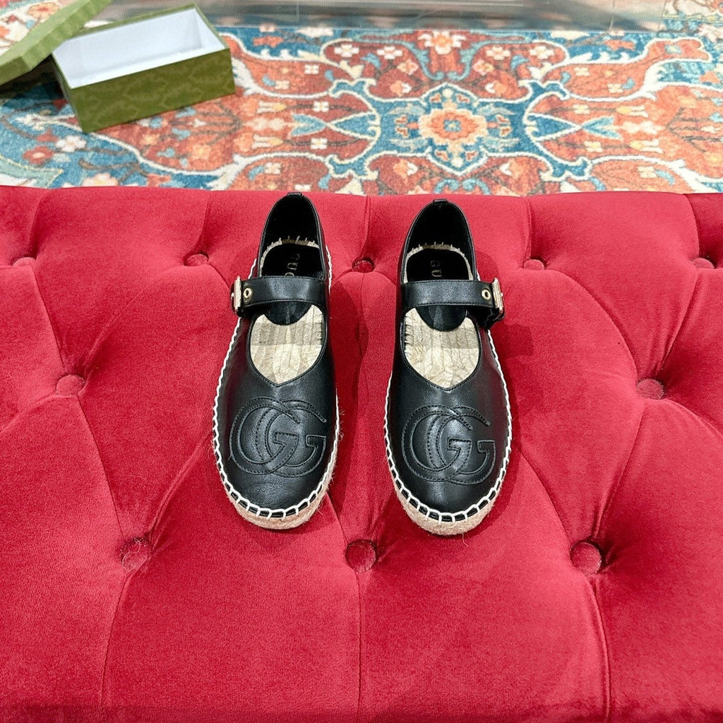 GG CROSS STRAP FLAT SHOES IN BLACK CALFSKIN WITH STRAW SOLE
