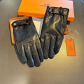 GLOVES WITH BUTTON IN BLACK SHEEPSKIN WITH LAMB FUR LINING