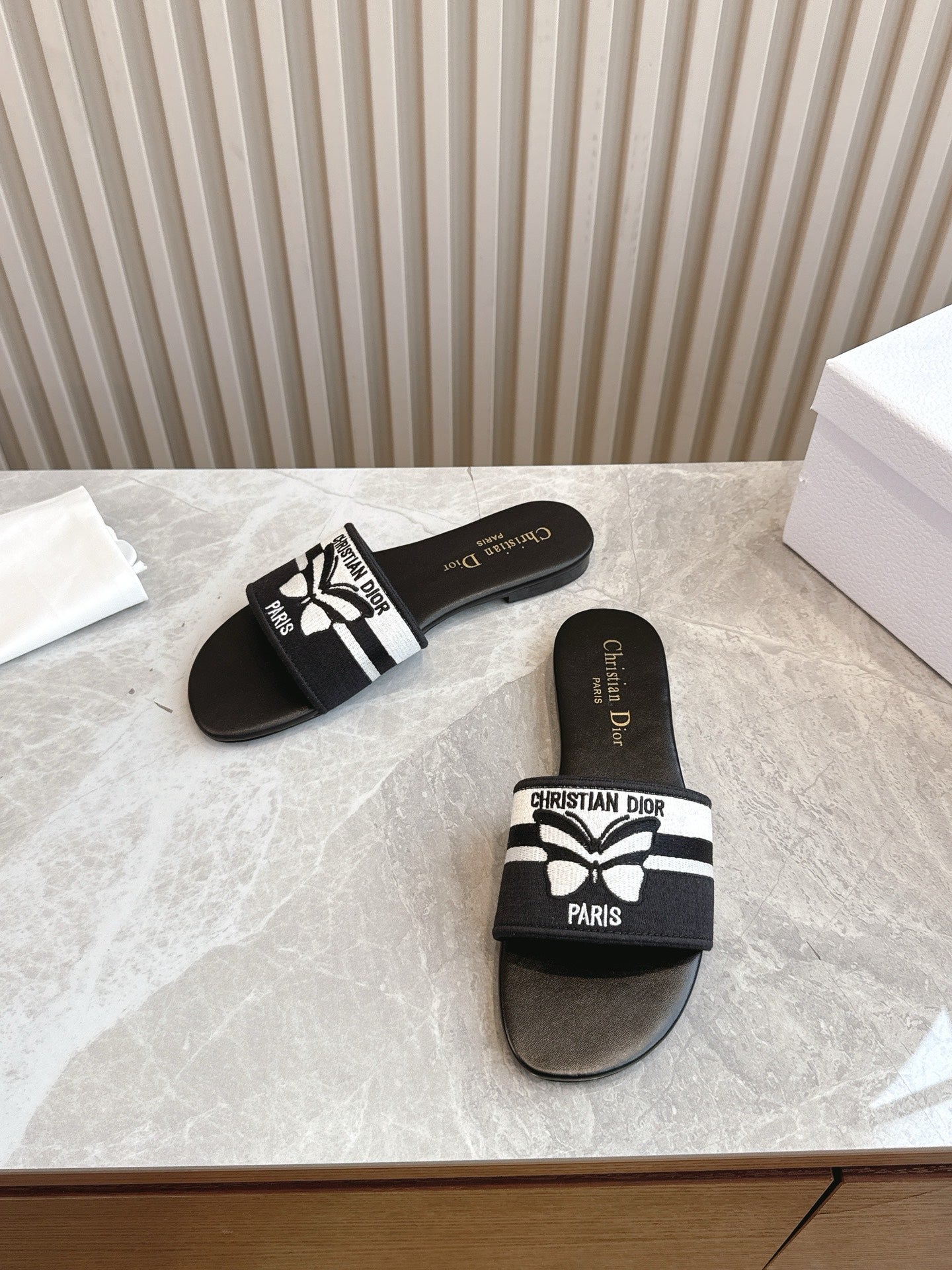 DIOR FLAT SLIDES 25S IN BLACK CALFSKIN AND FABRIC BRAND NAME EMBROIDERY