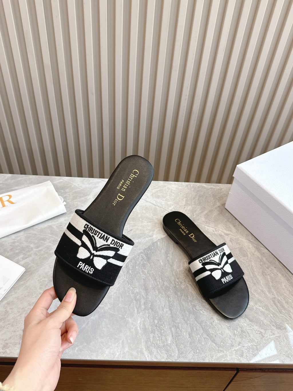 DIOR FLAT SLIDES 25S IN BLACK CALFSKIN AND FABRIC BRAND NAME EMBROIDERY