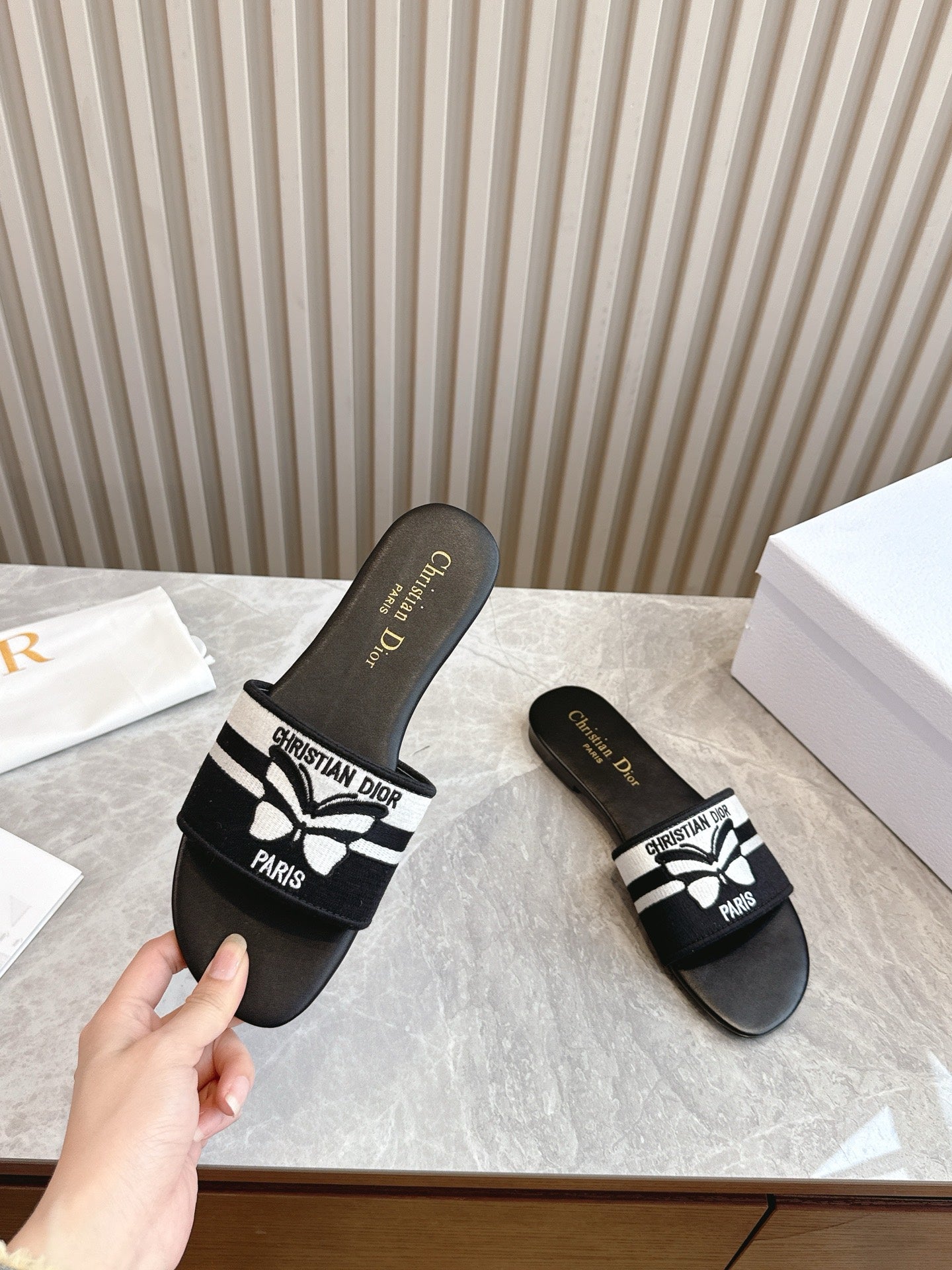 DIOR FLAT SLIDES 25S IN BLACK CALFSKIN AND FABRIC BRAND NAME EMBROIDERY