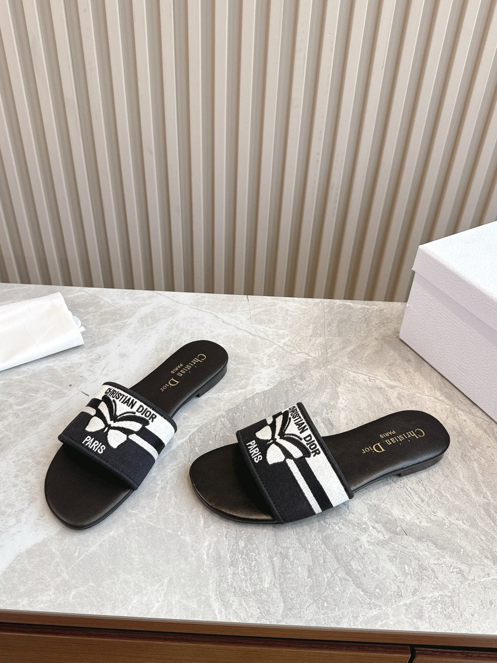DIOR FLAT SLIDES 25S IN BLACK CALFSKIN AND FABRIC BRAND NAME EMBROIDERY