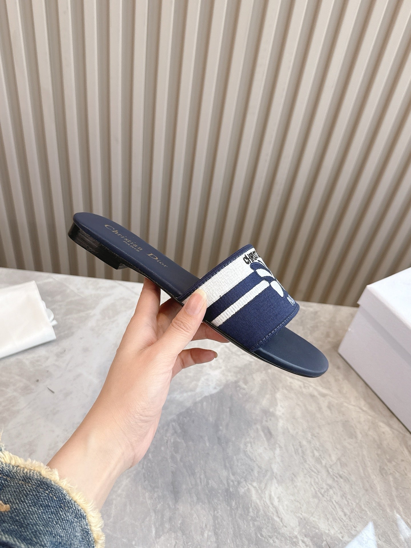 DIOR FLAT SLIDES 25S IN MIDNIGHT BLUE CALFSKIN AND FABRIC EMBROIDERED BUTTERFLY MOTIF