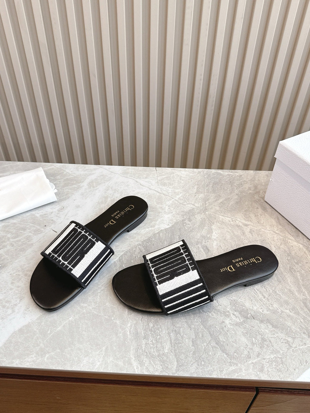 DIOR FLAT SLIDES 25S IN BLACK CALFSKIN AND FABRIC BRAND NAME EMBROIDERY