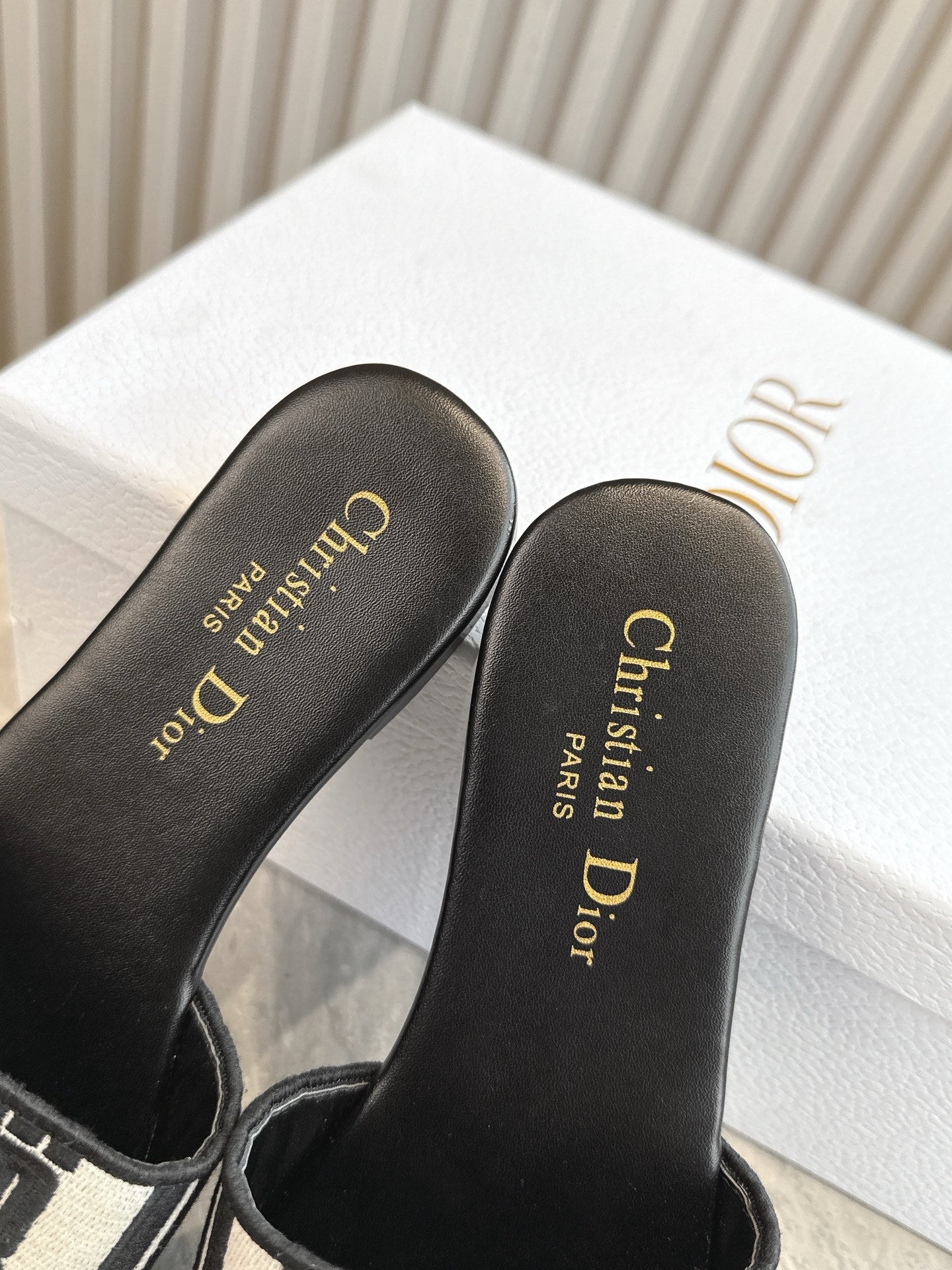 DIOR FLAT SLIDES 25S IN BLACK CALFSKIN AND FABRIC BRAND NAME EMBROIDERY