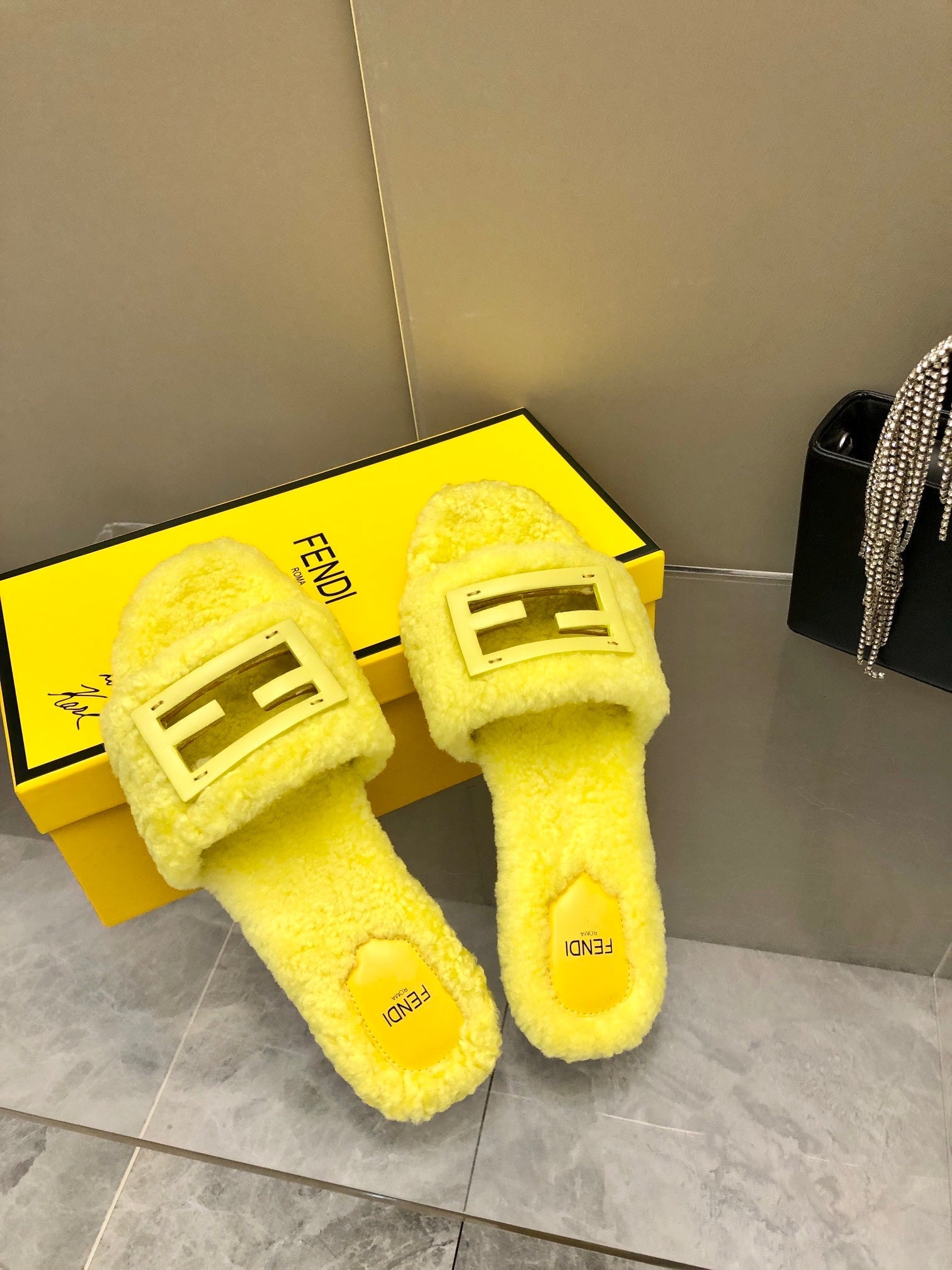 FENDI BAGUETTE SLIDE SLIPPERS IN BRIGHT YELLOW WOOL