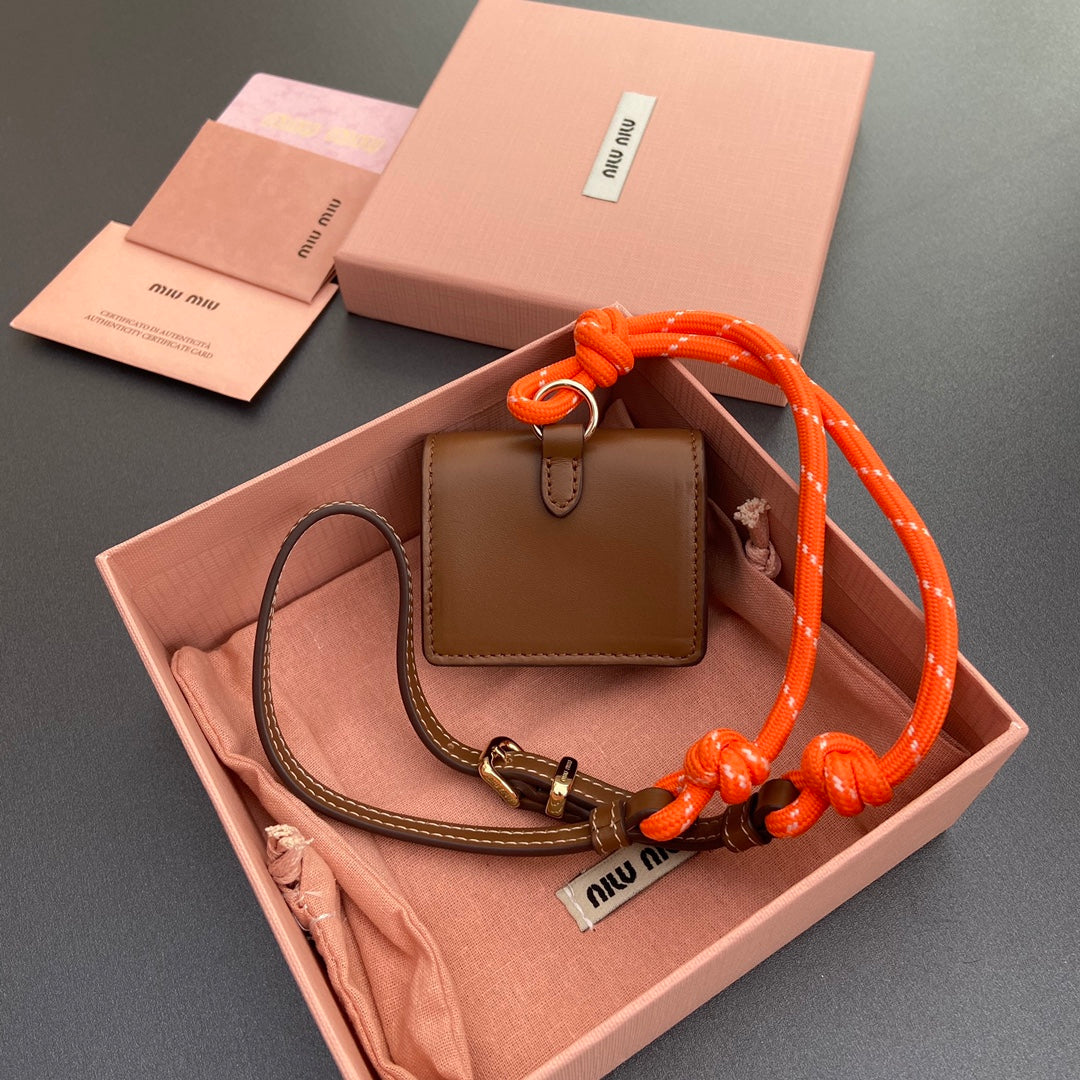 MICRO BAG 7 IN TAWNY BROWN SMOOTH LAMBSKIN ORANGE STRAP