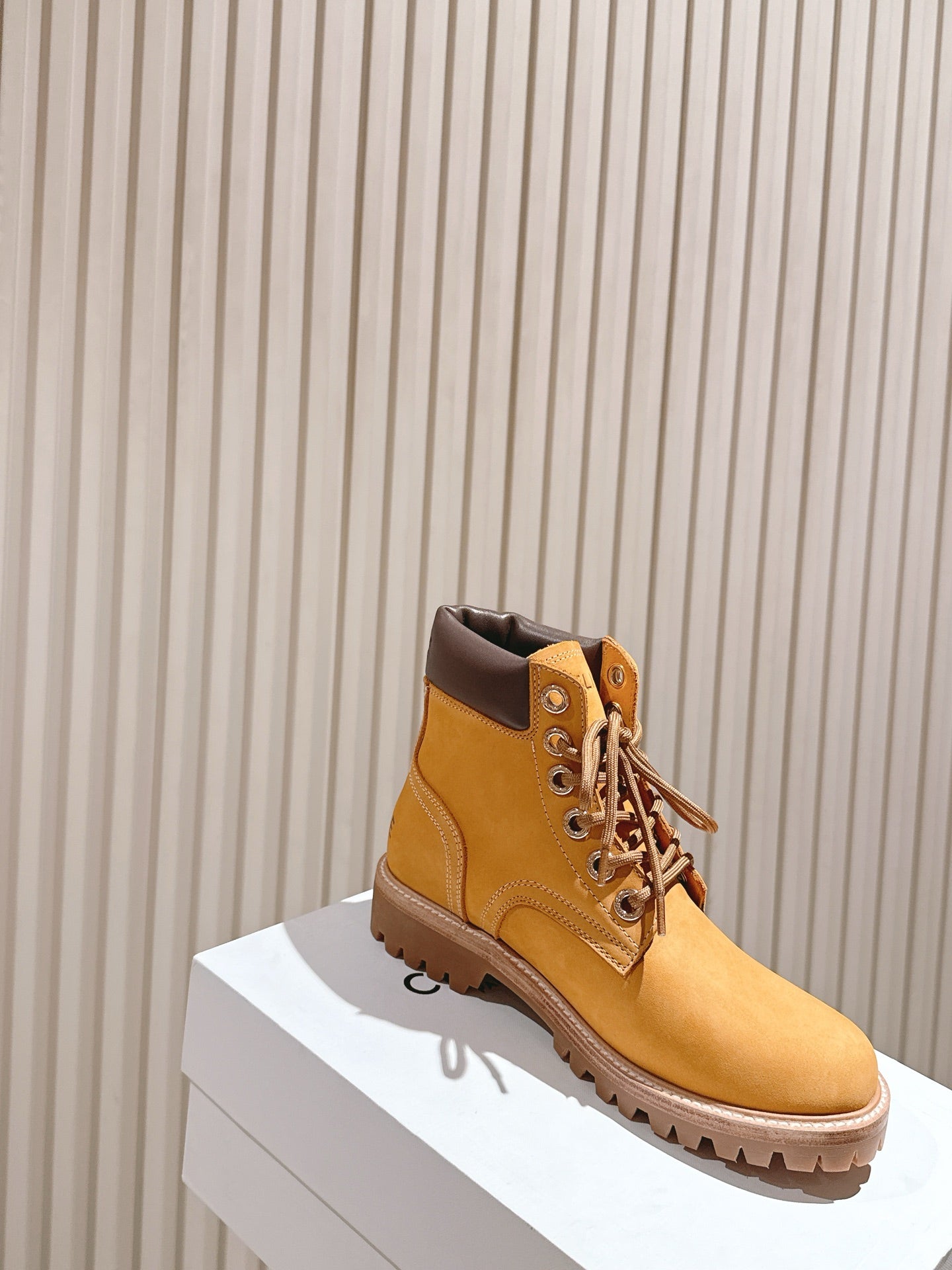 CELINE 25S MARTIN BOOTS IN MEDIUM ORANGE CALFSKIN