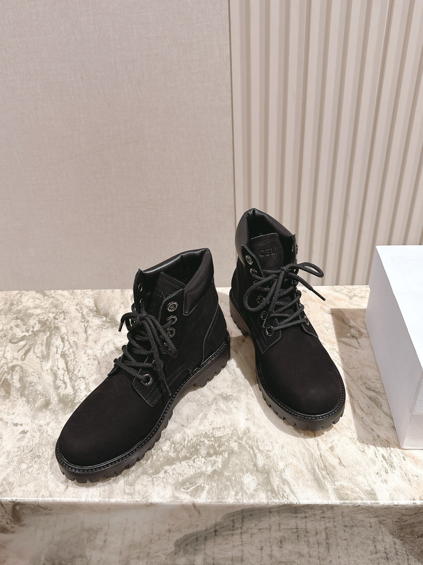 CELINE 25S MARTIN BOOTS IN BLACK CALFSKIN