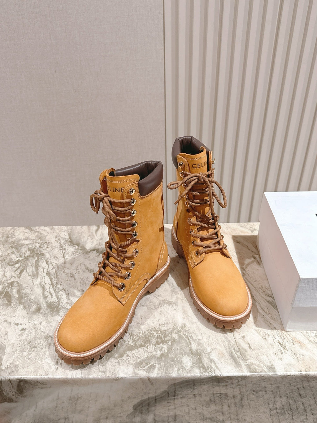 CELINE 25S SHORT MARTIN BOOTS IN MEDIUM ORANGE CALFSKIN