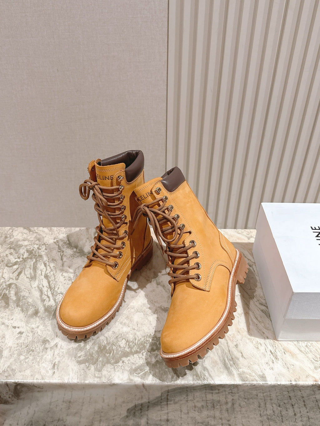 CELINE 25S SHORT MARTIN BOOTS IN MEDIUM ORANGE CALFSKIN