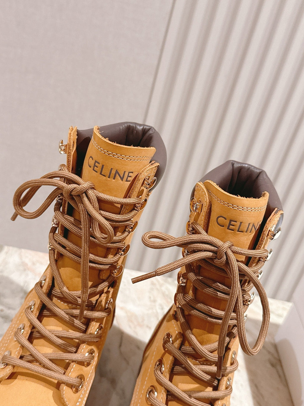 CELINE 25S SHORT MARTIN BOOTS IN MEDIUM ORANGE CALFSKIN